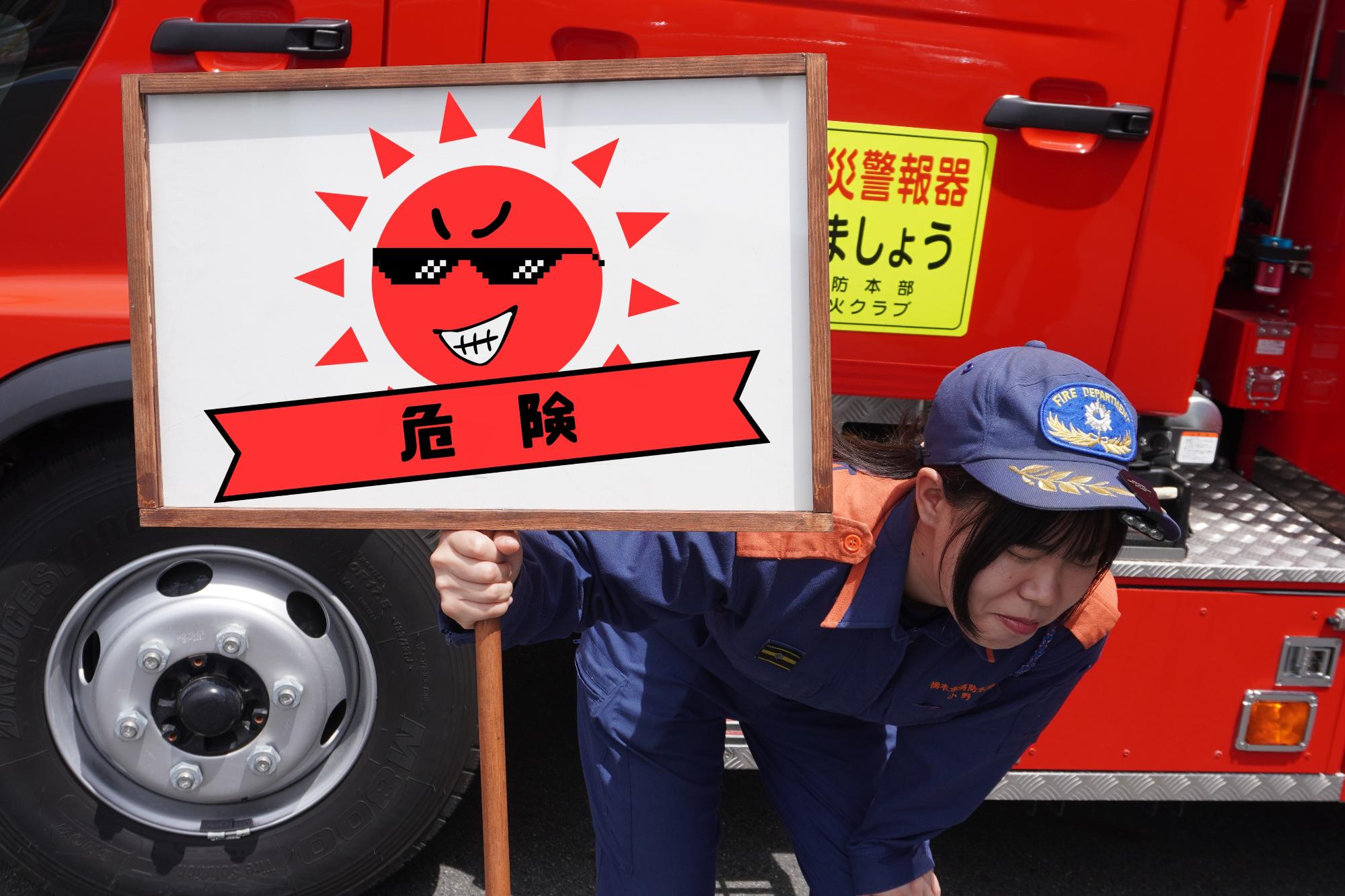 暑さでしんどそうにする人